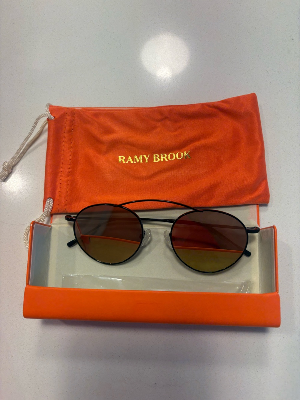 Ramy Brook Black Round Sunglasses with Amber Lenses